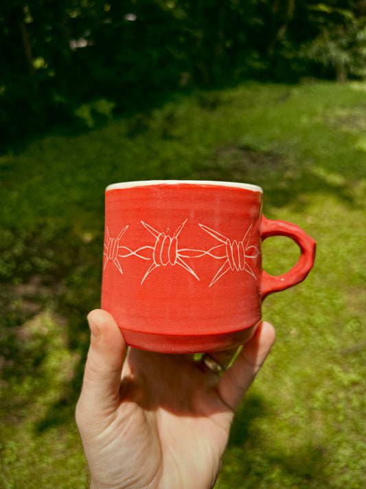 CRIMSON BARBED WIRE COFFEE MUG